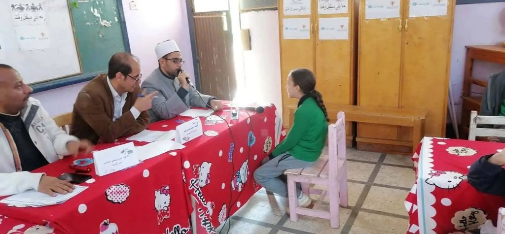 مدرسة الجامعة الأبتدائية الموحدة بأسيوط تحتفى برمضان بمسابقة ”دولة التلاوة القرآنية” لتشجيع الطلاب على حفظ القرآن